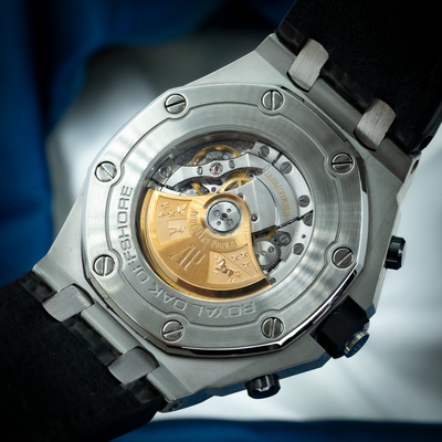Audemars Piguet Royal Oak Offshore Chronograph 26470ST.OO.A028CR.01, caseback with visible movement and gold rotor.