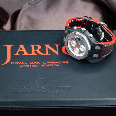 Audemars Piguet Jarno Trulli 26202AU.OO.D002CA.01, watch on top of box showing dial and strap.