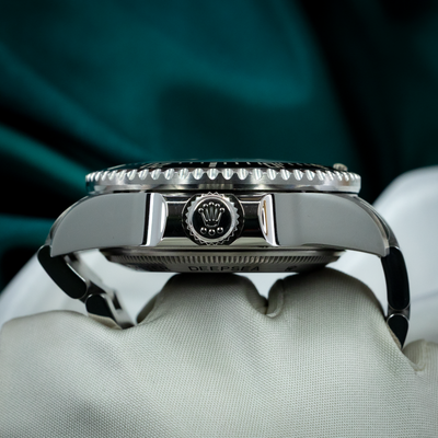 Rolex Sea-Dweller Deepsea 126660, side profile of the case, crown, and bezel, with "DEEPSEA" engraved.