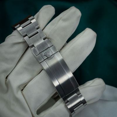 Rolex Sea-Dweller Deepsea 126660, brushed steel bracelet and clasp with Rolex crown logo.