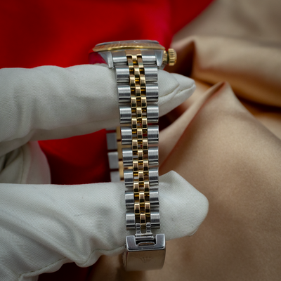 Rolex Oyster Perpetual Lady 67193, stainless steel and yellow gold Jubilee bracelet with crown-embossed clasp.