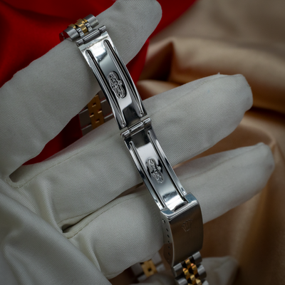 Rolex Oyster Perpetual Lady 67193, polished and brushed steel bracelet clasp with Rolex coronet logo.