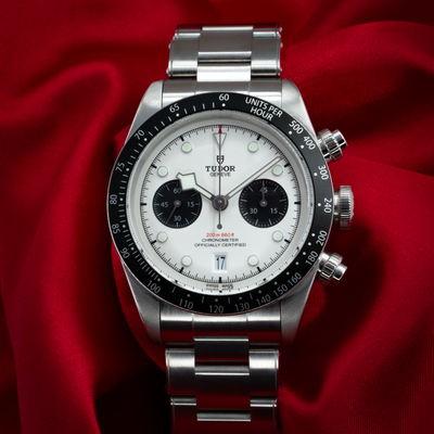 Tudor Black Bay Chrono M79360N-0002 watch, full dial view with white panda subdials and steel bracelet.