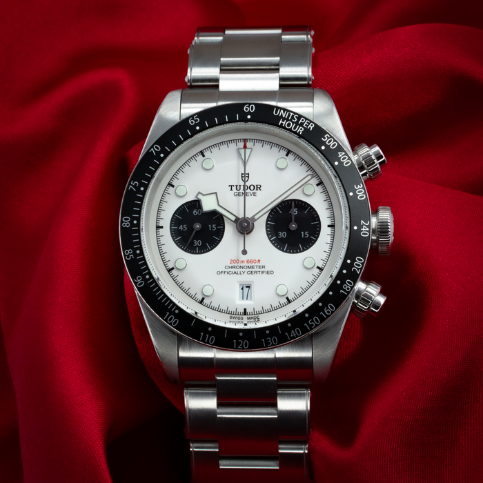 Tudor Black Bay Chrono M79360N-0002 watch, full dial view with white panda subdials and steel bracelet.