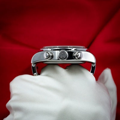 Tudor Black Bay Chrono M79360N-0002 side view, showing crown, pushers, and polished steel case.