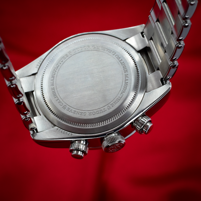Tudor Black Bay Chrono M79360N-0002 caseback, showing the brushed metal caseback, engraved text, crown, and pushers.