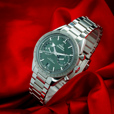 Omega Speedmaster 57 Chronograph 332.10.41.51.10.001 watch with green dial and stainless steel bracelet.