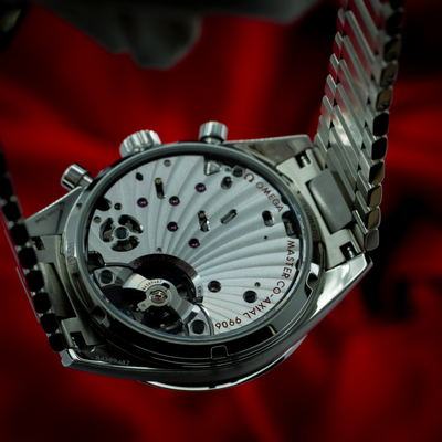 Omega Speedmaster 57 Chronograph 332.10.41.51.10.001, exhibition caseback showing movement, jewels, and inscriptions.