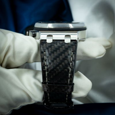 Audemars Piguet Royal Oak Offshore Chronograph 26470ST.OO.A028CR.01, close-up of lug and carbon fiber strap.