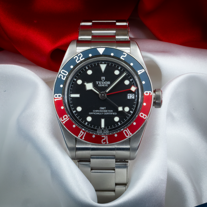 Tudor Black Bay GMT M79830RB-0001 dial, stainless steel bracelet, and blue and red 