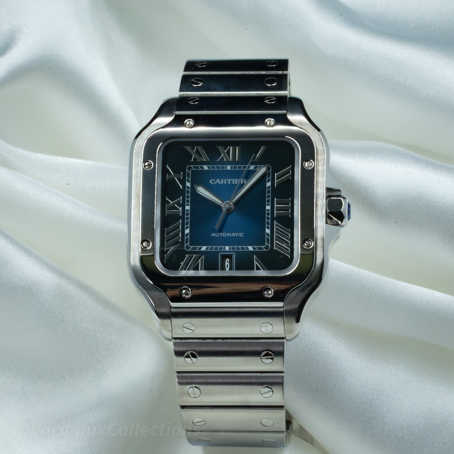 Cartier Santos WSSA0063 watch with blue dial and polished steel case, featuring Roman numerals.
