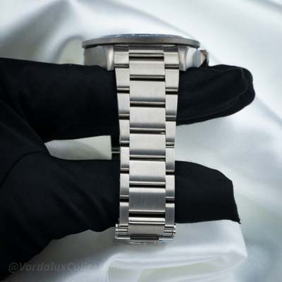 Tudor Pelagos Blue Titanium M25600TB-0001, side view of the titanium bracelet and watch case on a black watch pillow.