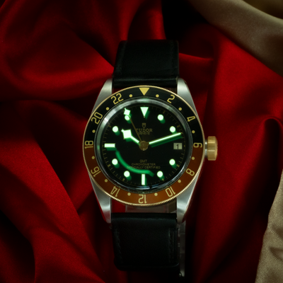 Tudor Black Bay Gmt S&g M79833MN-0003, luminous dial on black leather strap.