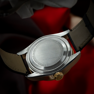 Tudor Black Bay Gmt S&g M79833MN-0003, gold and steel caseback with engraved details.