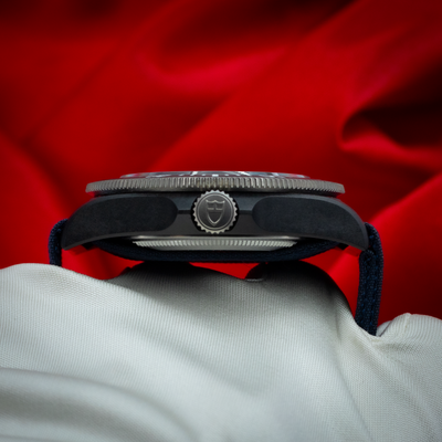 Tudor Alinghi Red Bull Pelagos Fxd – Racing M25707KN watch side view with crown and ribbed bezel.