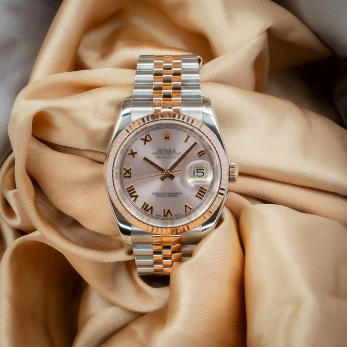 Rolex Datejust 36 116231 watch, champagne dial with Roman numerals and two-tone Jubilee bracelet.