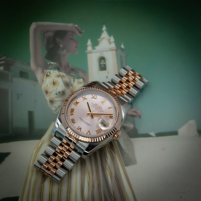 Rolex Datejust 36 reference 116231 dial, rose gold fluted bezel, and two-tone Jubilee bracelet.