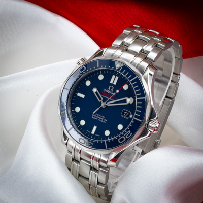 Omega Seamaster Diver 212.30.41.20.03.001, angled view of the watch dial, bezel, and steel bracelet.