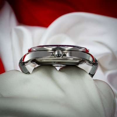 Omega Seamaster Diver 212.30.41.20.03.001, side view of the polished and brushed steel case and crown.
