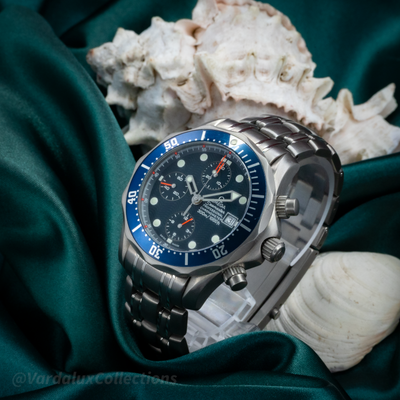 Omega Seamaster 2298.80.00 watch, angled view showing the dial, blue bezel, pushers, and part of the metal bracelet.