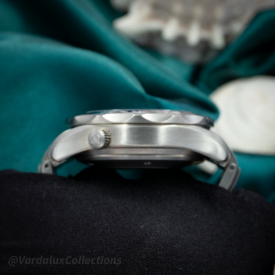 Omega Seamaster 2298.80.00 watch, side view of case and crown with Omega logo.