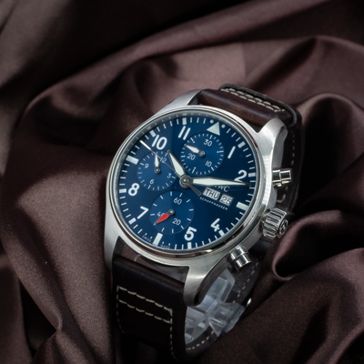 IWC Pilot Chronograph IW388101, blue dial with white indices and subdials, date and day display.