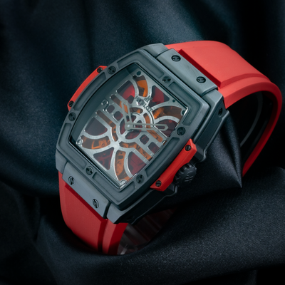 Hublot Spirit of Big Bang Red Vitrail Limited Edition 312.CI.0002.LR, close-up of dial and crown on black fabric.