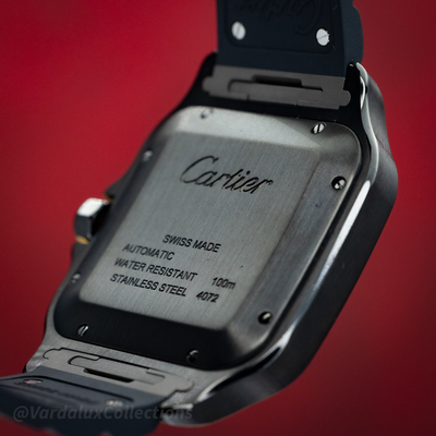 Cartier Santos De Cartier WSSA0039, brushed stainless steel caseback with engraved text and screws.