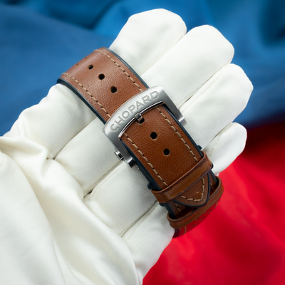 Chopard Mille Miglia Gts Race Edition 2022 168571-3010, close-up of brown leather strap and steel pin buckle clasp.
