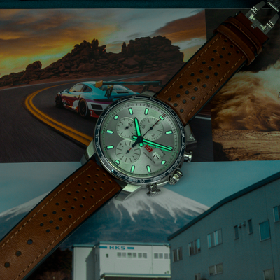 Chopard Mille Miglia Gts Race Edition 2022 168571-3010 dial with glowing hands and brown leather strap.