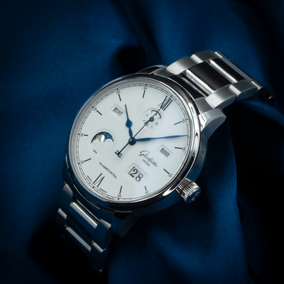 Glashütte Original Senator Excellence 1-36-02-01-02-61 dial, close-up of white dial, blue hands, and date display.