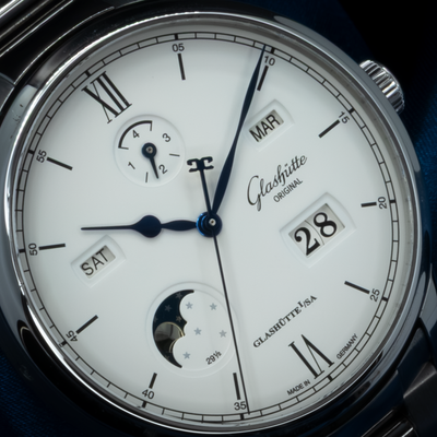 Glashütte Original Senator Excellence 1-36-02-01-02-61 dial, close-up showing date, month, day, power reserve, and moon