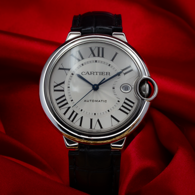 Cartier Ballon Bleu Silver Dial 40mm WSBB0039, a silver watch with a black leather strap and blue hands, dial.