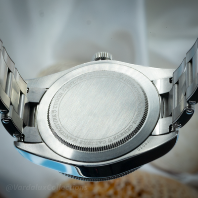 Tudor Black Bay 58 79030B caseback and bracelet with "79030" engraving visible.