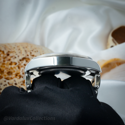 Tudor Black Bay 58 79030B watch, case profile and polished lugs with a black glove.