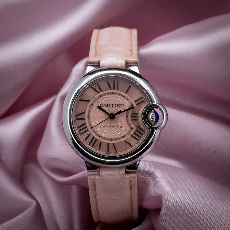 Cartier ballon bleu wsbb0002 watch, a full view of the light pink dial with Roman numerals and light pink leather strap.