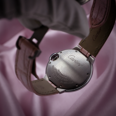 Cartier ballon bleu wsbb0002 caseback and pink leather strap with Cartier inscription.