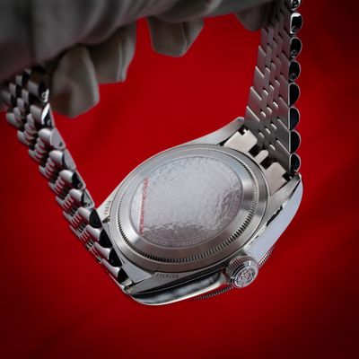 Tudor Black Bay GMT 79830RB, close-up of the watch's caseback and crown.