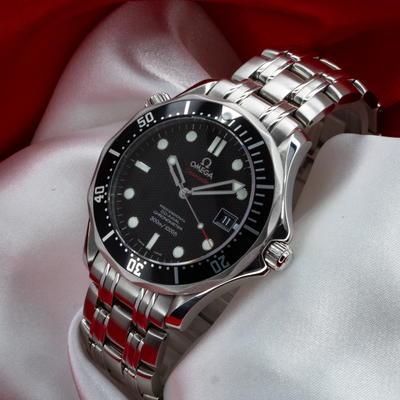 Omega Seamaster 212.30.41.20.01.002, full face view showcasing the black wave dial with luminous markers and hands.