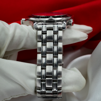 Omega Seamaster 212.30.41.20.01.002 watch side view showing polished and brushed bracelet links and crown.