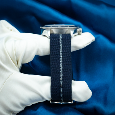 Tudor Black Bay Fifty-eight Blue M79030B-0003 side view, with blue textile strap and crown.
