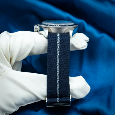 Tudor Black Bay Fifty-eight Blue M79030B-0003 watch side profile showing crown, case, and blue fabric strap.