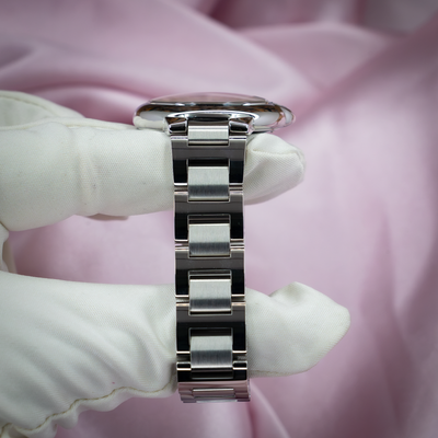 Cartier Ballon Bleu W6920100, close-up side view of stainless steel bracelet links.