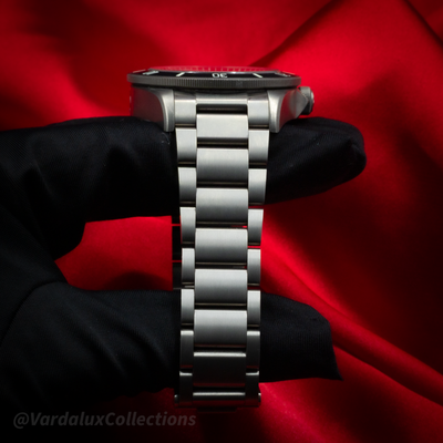 Tudor Pelagos 25600TN watch, side profile showing bezel, crown, titanium case and bracelet.