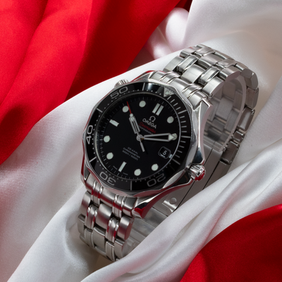 Omega Seamaster Diver 212.30.41.20.01.003, full watch view with black dial, stainless steel case, and bracelet.