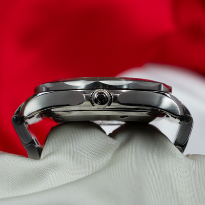Omega Seamaster Diver 212.30.41.20.01.003, side view showing crown and helium escape valve.