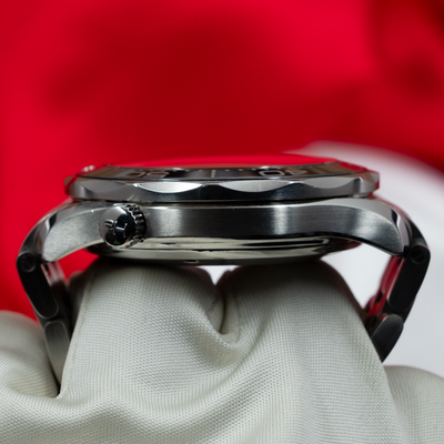 Omega Seamaster Diver 212.30.41.20.01.003, close-up side view of case, crown, and bezel.