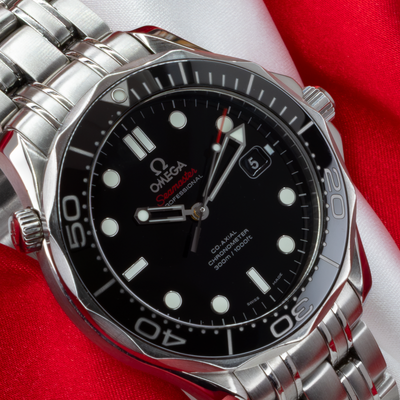 Omega Seamaster Diver 212.30.41.20.01.003, full dial view with stainless steel bracelet and crown.