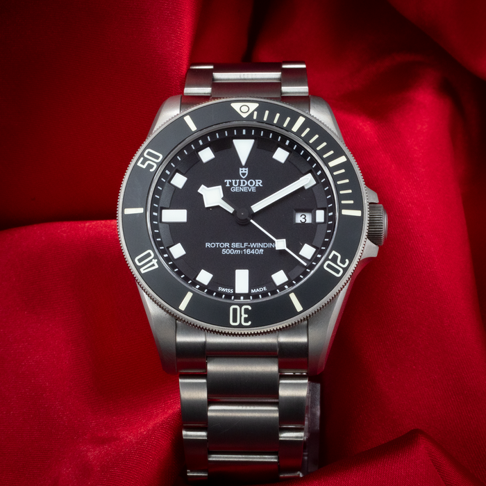 Tudor Pelagos 25500TN, full face view of the black dial, luminous markers, and titanium bracelet.