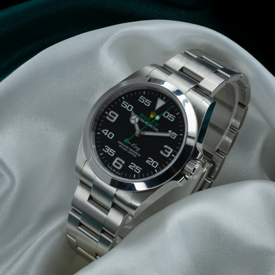 Rolex Air King Automatic Black Dial 126900, close-up of the watch face with hour, minute, and seconds hands.